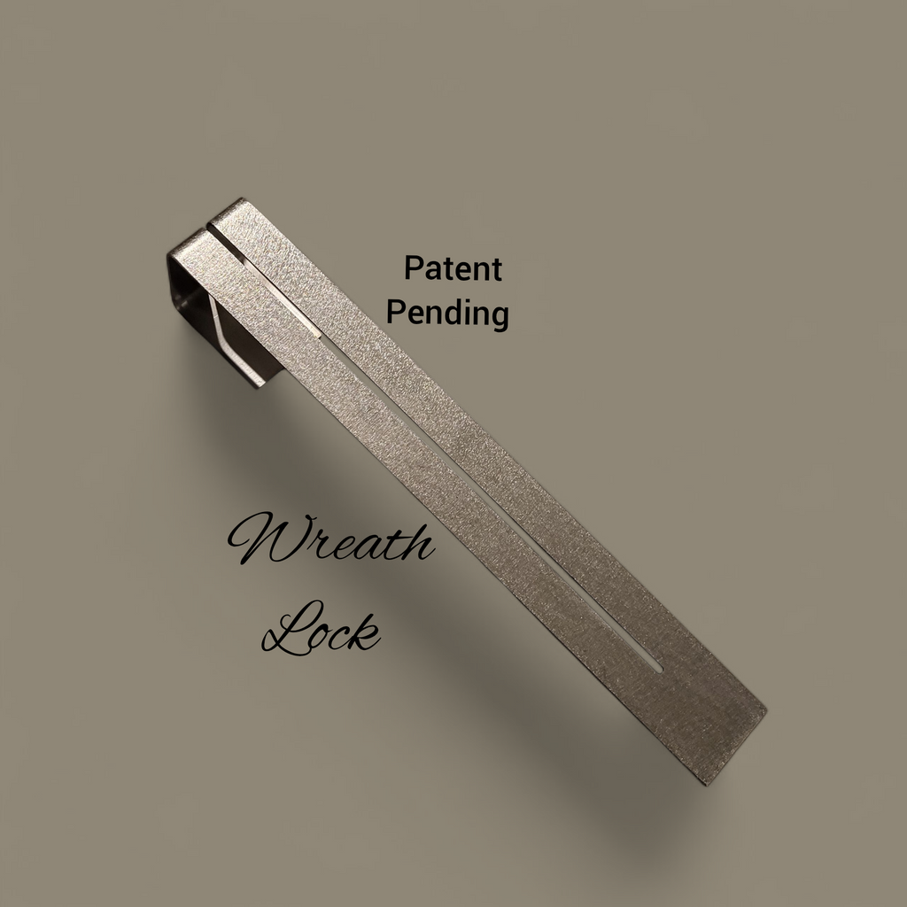 Metallic wreath lock on a beige background with 'Patent Pending' text.